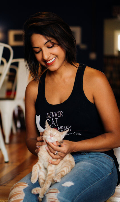 Leila Qari with a lucky kitty.